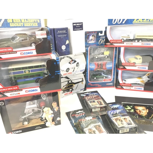 99 - A Collection of Boxed Corgi James Bond Vehicles. A Never Say Never Again Film Cell and playing Cards... 