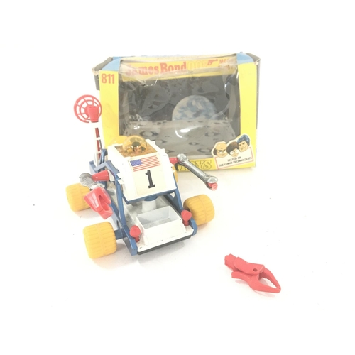 10 - A Boxed Corgi Toys James Bond Moon Buggy #811. A/F.