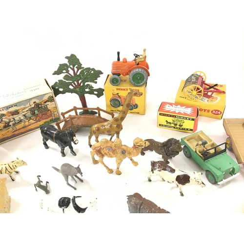 105 - A Collection of Dinky Toys and Britainâs Farm Animals.