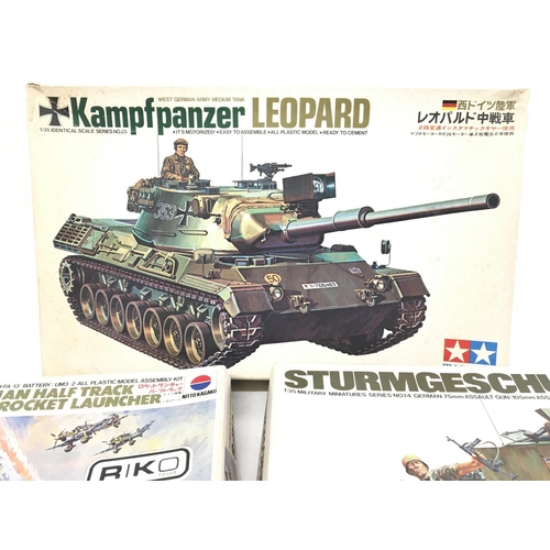 1154 - 3 Model Kits including a German Half Track. (3).