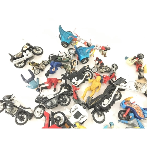 122 - A Box Containing a Collection of loose Toy Motor Cycles including Batman and Spider-Man.