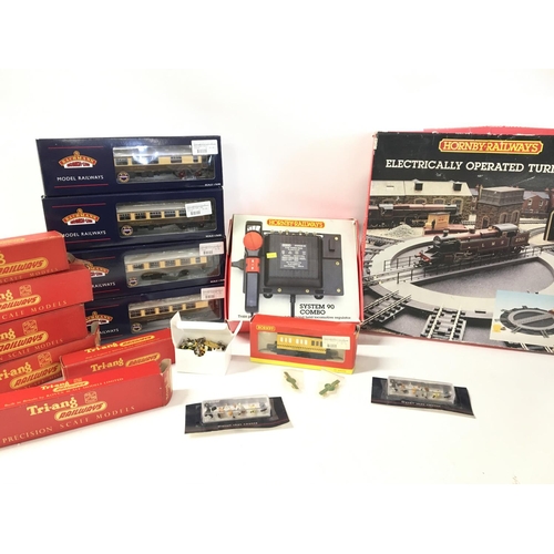 1255 - 2 Boxes Containing Boxed Bachmann. Hornby and Tri-Ang Coaches. Rolling Stock and accessories.(2).