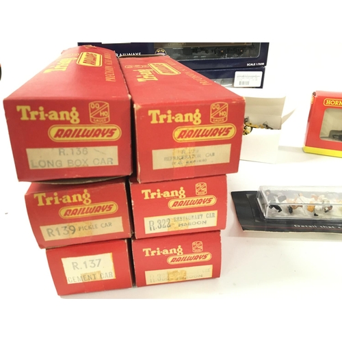 1255 - 2 Boxes Containing Boxed Bachmann. Hornby and Tri-Ang Coaches. Rolling Stock and accessories.(2).