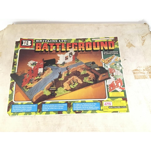 132 - A Boxed Britainâs Battleground #4715. Parts Missing .Box is worn.