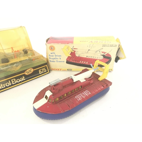 14 - A Boxed Dinky Toys Motor Patrol Boat #675 and a S.R.N. 6 Hovercraft a/f . #290.