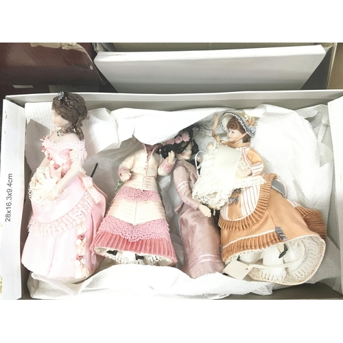 143 - A Collection of 4 Boxed Dolls and 4 Small loose Dolls. Including the Hamilton Collection.