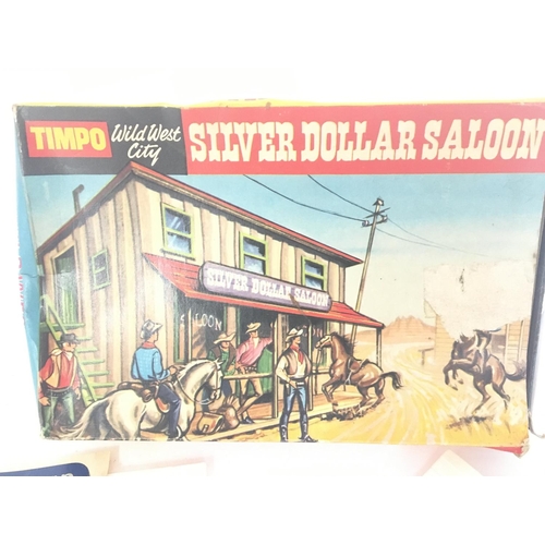 148 - A Boxed Timpo Silver Doller Saloon.