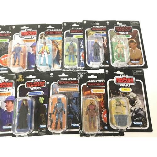 159 - Collection of 15 carded Star Wars figures with majority from the vintage collection.