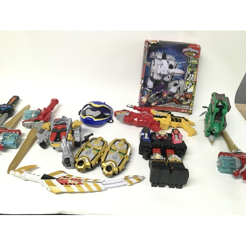 164 - A large collection of assorted power Ranger items.