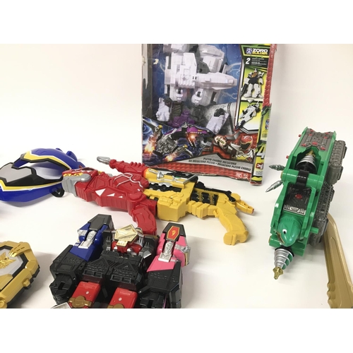 164 - A large collection of assorted power Ranger items.