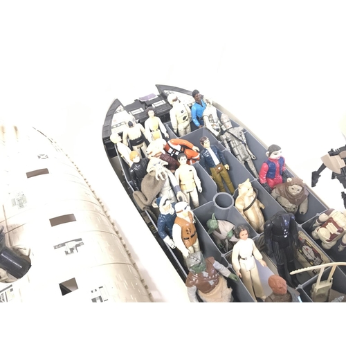 165 - A collection of vintage Star Wars items including rebel transport and figures etc.