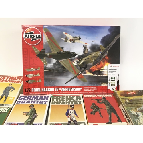 167 - A collection of Airfix plastic figures and kits including WWII coastal defence kit - Pearl harbour a... 