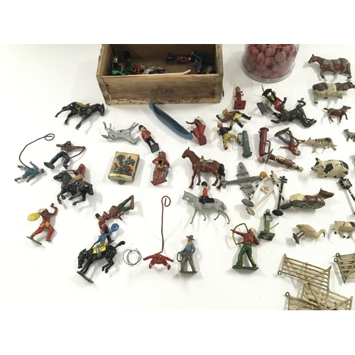 176 - A collection of playworn Britain farm animals and other figures including some dinky.