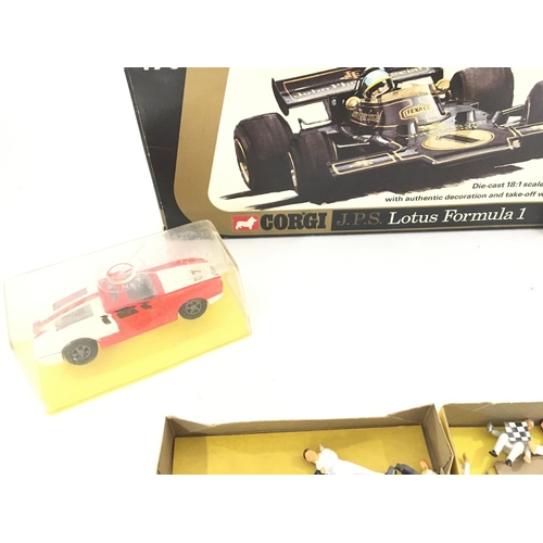 182 - A Boxed Corgi Renault 16 #260. A Corgi Lotus F1 #190. A Dinky De Tomaso Mangusta. A Corgi Jaguar E T... 