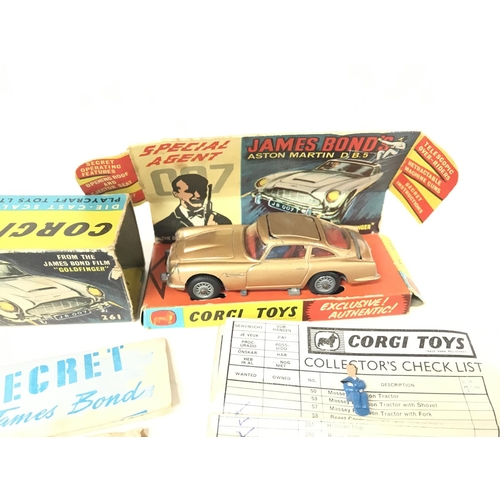 204 - A Boxed Corgi James Bond Aston Martin D.B.5 #261 includes Spare Villain. A Ticked Check List and ins... 