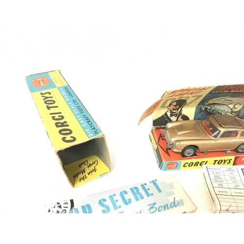 204 - A Boxed Corgi James Bond Aston Martin D.B.5 #261 includes Spare Villain. A Ticked Check List and ins... 