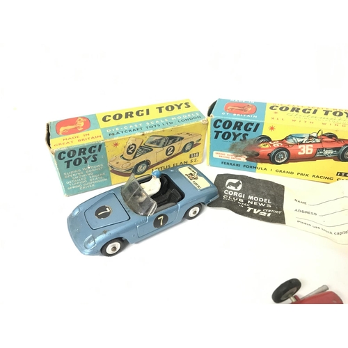 209 - A Boxed Corgi Lotus Elan S2 #318. A Ferrari Formula 1 Car #154 and a Chrysler Imperial #246.