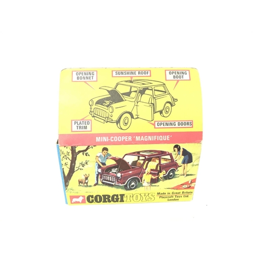 212 - A Boxed Corgi Mini-Cooper Magnifique #334.