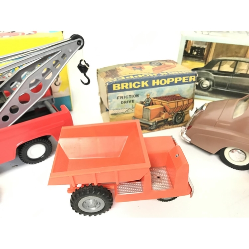 217 - A Boxed Friction Powered Wrecker Truck. A Brick Hopper and a Battery Powered Silver Cloud Rolls-Royc... 