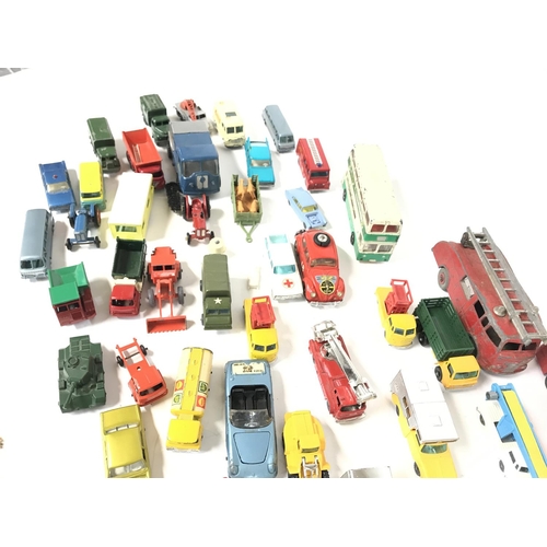 219 - A Collection of Playworn Diecast including Huskey. Matchbox. Dinky etc.