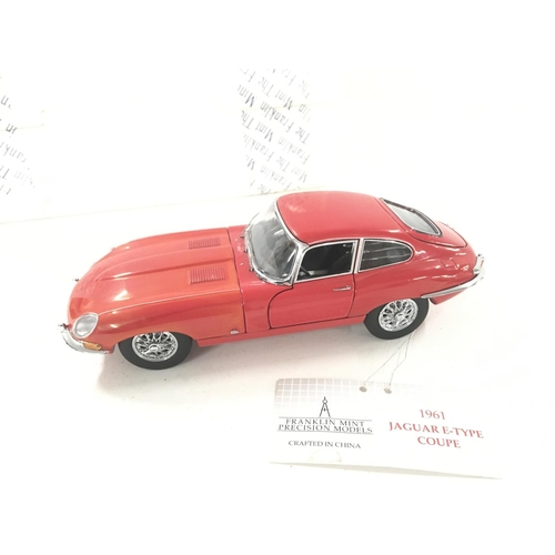 224 - A Boxed Franklin Mint 1961 Jaguar E-Type Coupe.