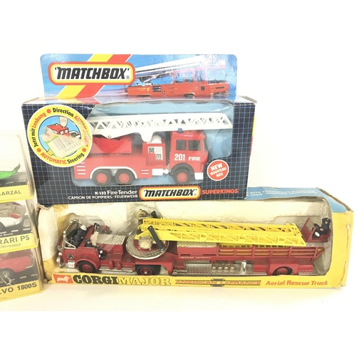 229 - A Collection of Boxed Dinky. Corgi and Matchbox Vehicles. Boxes are worn.