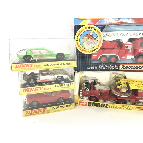 229 - A Collection of Boxed Dinky. Corgi and Matchbox Vehicles. Boxes are worn.