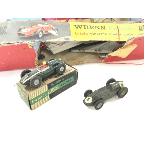 244 - A Wrenn Formula 152 Set with a boxed Car. Cooper. Box Is worn.