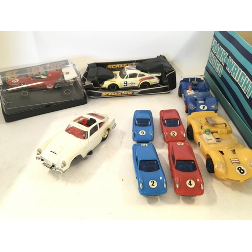 246 - A Box Containing Scalextric and other slot Cars in Various States. Also Track and other Accessories.