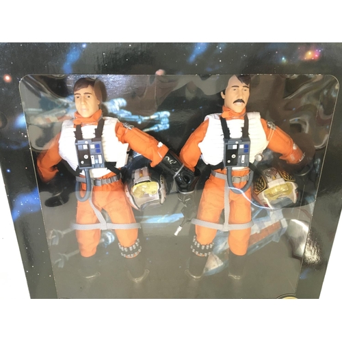 254 - A Boxed Star Wars Action Collection Wedge Antilles and Biggs Darklighter Pilot Set. 12â figures.