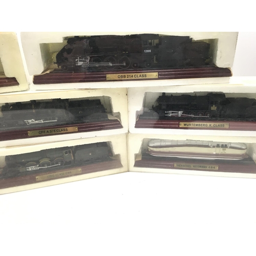 276 - A Box Containing a Collection of Atlas Model Locomotives.