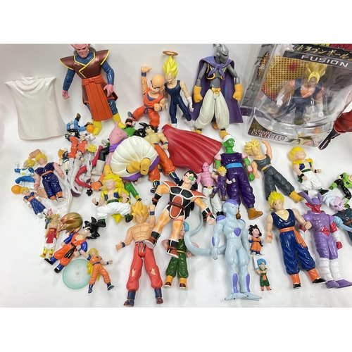 303 - A Collection of Dragon Ball Z Figures including a Boxed Fusion.