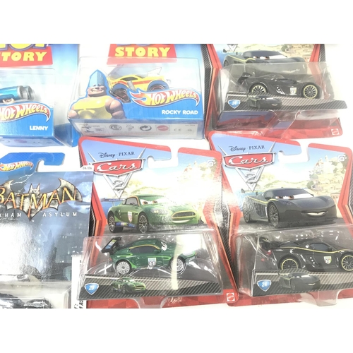 331 - A Box Containing a Collection of Carded Batman Hot Wheels and Pixars Cars.