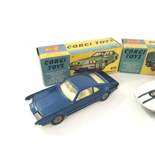 34 - 3 X Boxed Corgi Vehicles including a Oldsmobile Tornado #264 a Marcos 1800GT #324 and a Volvo P.1800... 