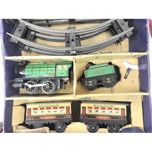 345 - A Boxed Clockwork Hornby Train MO Passenger Set.box is worn.