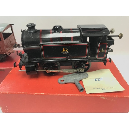 346 - A Boxed Hornby O Gauge Loc-Tender No.40 with Key. And with Goods Van and Cattle Truck.