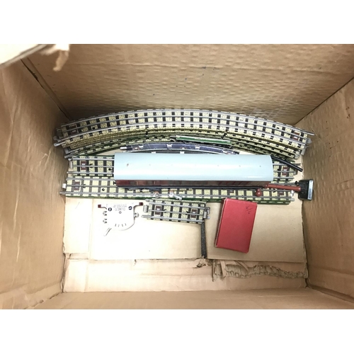 348 - A Box Containing Hornby Dublo 00 Gauge Track. Signals. Trucks. Etc. Mostly Boxed.