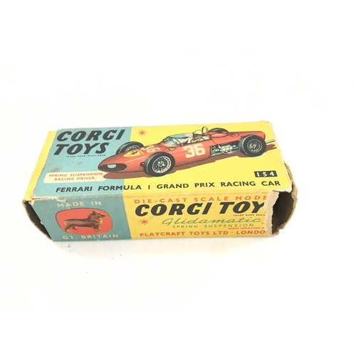 37 - A Boxed Corgi Cooper-Maserati #159. A Cooper-Maserati #156 and a Ferrari #154.