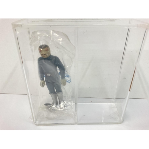 413 - A Vintage Star Wars Snaggletooth in a sealed Kenner Bag. Also in a Perspex case.