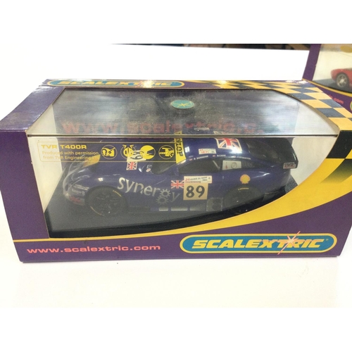 428 - 3 X Boxed Scalextric Vehicles. A Dodge Viper #C2522. A Ford GT #C2661 and TVR Tuscan 400 R #C2657.