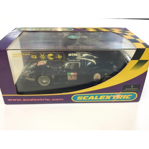 429 - 2 X Boxed Scalextric Vehicles. A Jaguar XKRS Rocksports #C2711. A Maserati MC12 #C2630.