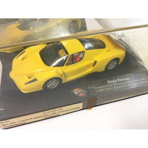 430 - 2 Boxed Carrera Evolution Slot Cars. A Enzo Ferrari and a Aston Martin V12 Vanquish.