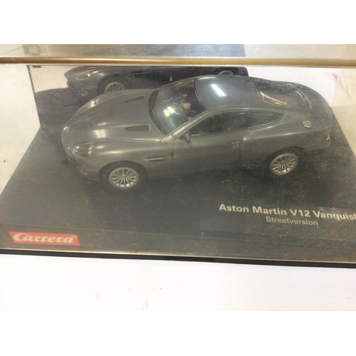 430 - 2 Boxed Carrera Evolution Slot Cars. A Enzo Ferrari and a Aston Martin V12 Vanquish.