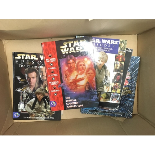 467 - A Box Containing A Collection of Star Wars Figures. Ships and Books.