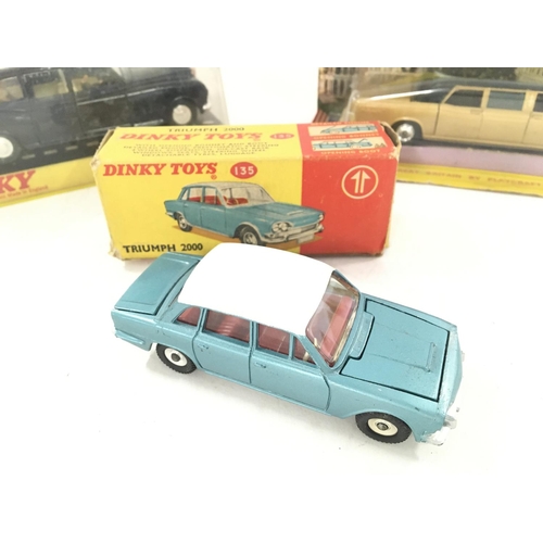 47 - A Boxed Dinky Rolls Royce #152 a Triumph 200 #135 and a Corgi Lincoln Continental #262.