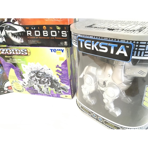 496 - A Box Containing Robosapien Robots. A Zoid and a Teksta Robo Dog.