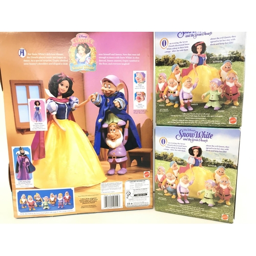 497 - A Boxed Mattel Snow White Dance and Play Gift Set and 2 Extra Boxed Dwarfs.