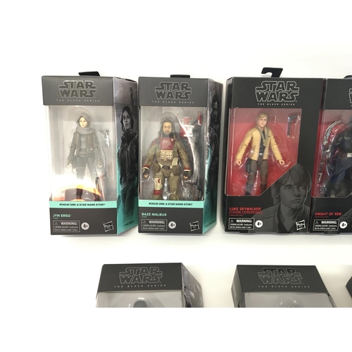 52 - A collection of Star Wars black series figures and vintage collection figures all in packaging.