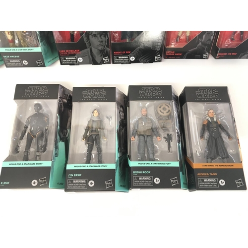 52 - A collection of Star Wars black series figures and vintage collection figures all in packaging.