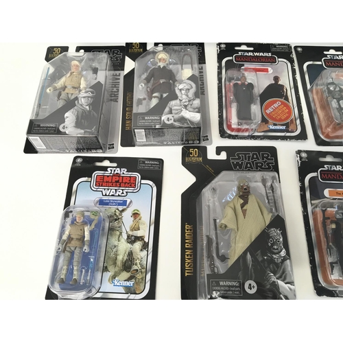 54 - Collection of various Star Wars figures including black series and retro collection.